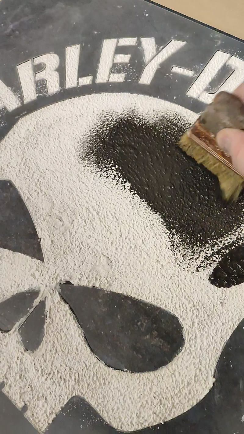 Brushing on the dark undercoat